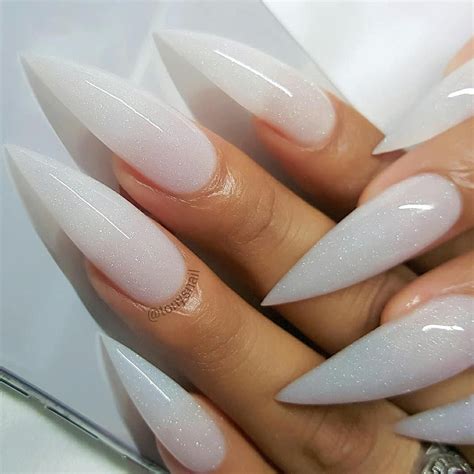 white stiletto nails with rhinestones|medium stiletto nails.